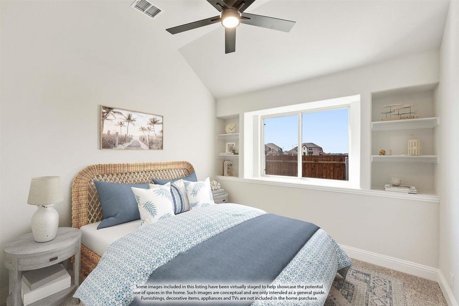 Bedroom with vaulted ceiling, ceiling fan, built-in shelves, and large window with neighborhood view Bedroom with vaulted ceiling, ceiling fan, built-in shelves, and large window with neighborhood view