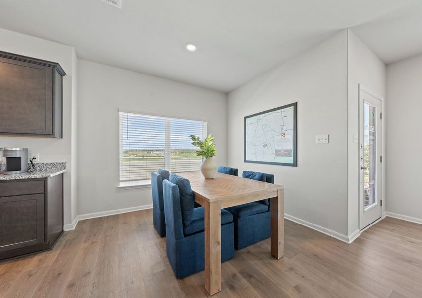 The dining room has large windows that let in great, natural light. The dining room has large windows that let in great, natural light.