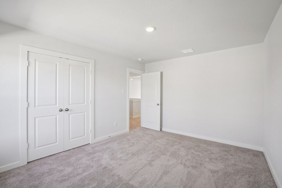 A room with white doors.