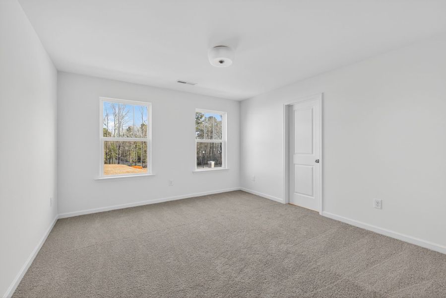 Spacious, unfurnished interior of a new home in Copper Ridge at Flowers Plantation, Clayton (Image 20).