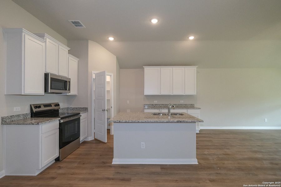Furnished interior view inside a new home in Greenspoint Heights, Seguin (Image 5).