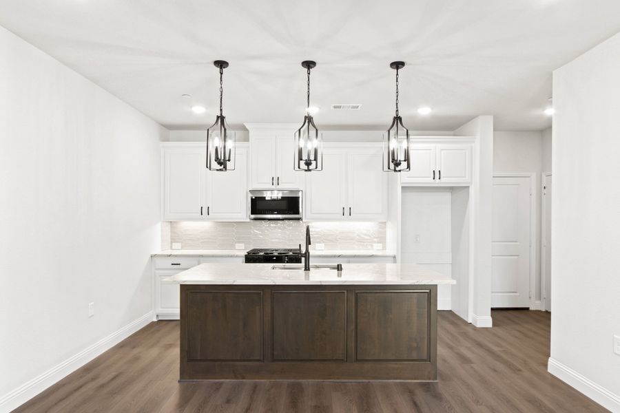 Furnished interior view inside a new home in The Tribute, The Colony (Image 8).