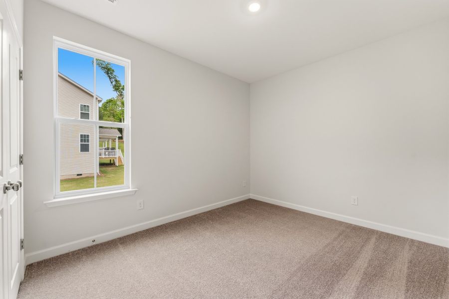 Spacious, unfurnished interior of a new home in Landing at Pine Lake, Anderson (Image 33).