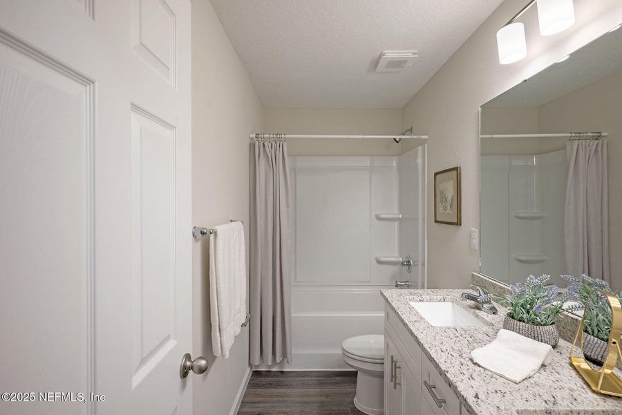 Furnished interior view inside a new home in , Jacksonville (Image 32).