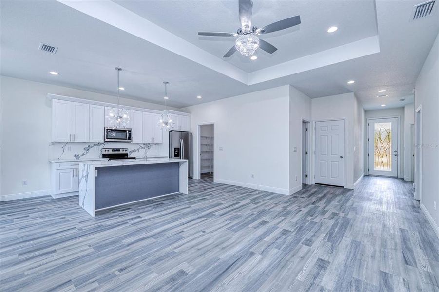 Furnished interior view inside a new home in , Port Charlotte (Image 13). Furnished interior view inside a new home in , Port Charlotte (Image 13).