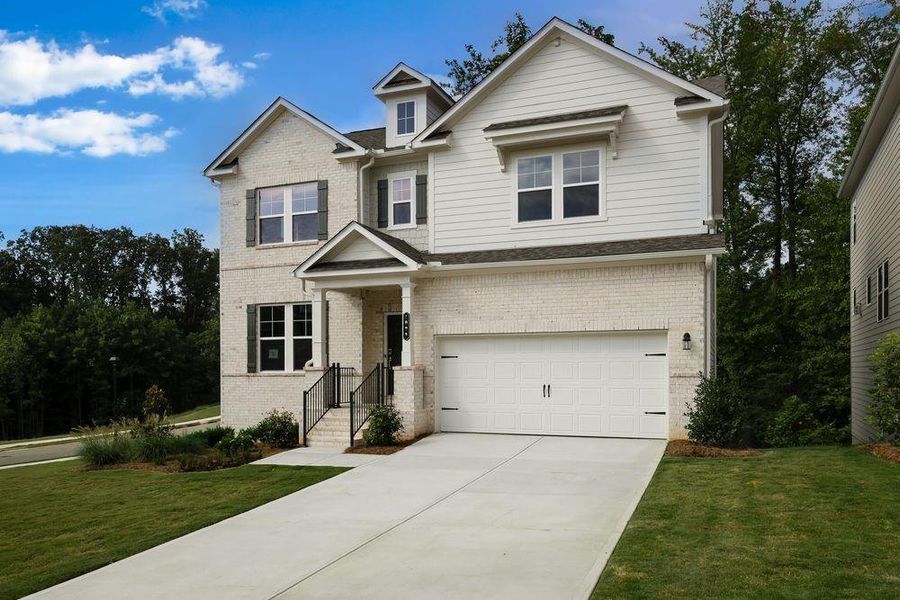 Front exterior of a new home in Falls Creek, Flowery Branch, GA, highlighting curb appeal (Image 20). Front exterior of a new home in Falls Creek, Flowery Branch, GA, highlighting curb appeal (Image 20).