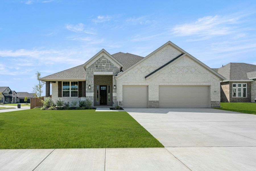 Representative exterior photo of a completed home built from the Garner by Kindred Homes in Westside Preserve, Midlothian, TX (Image 22).