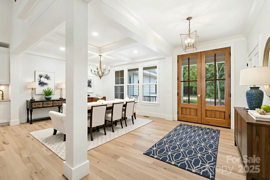 Living looking into foyer and dining 9virtually staged) Living looking into foyer and dining 9virtually staged)