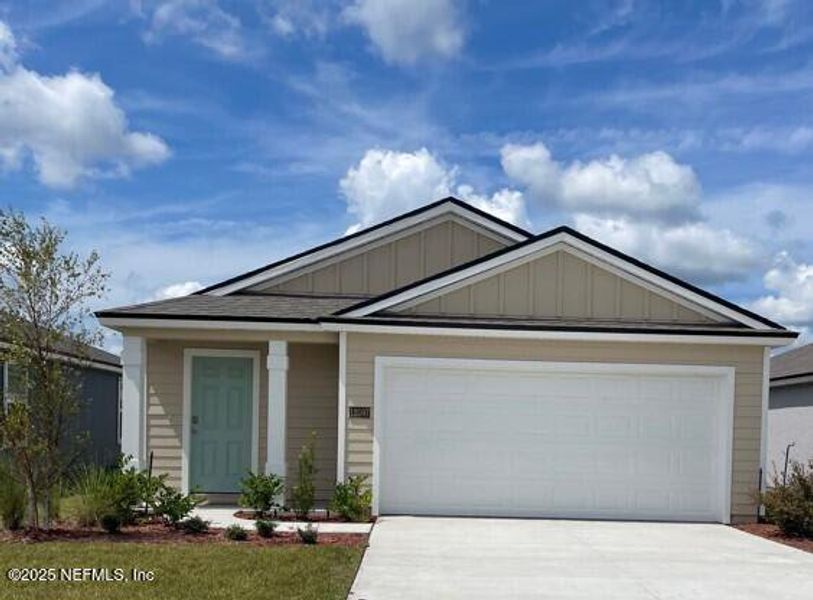 Front exterior of a new home in The Arbors, Jacksonville, FL, highlighting curb appeal (Image 1).