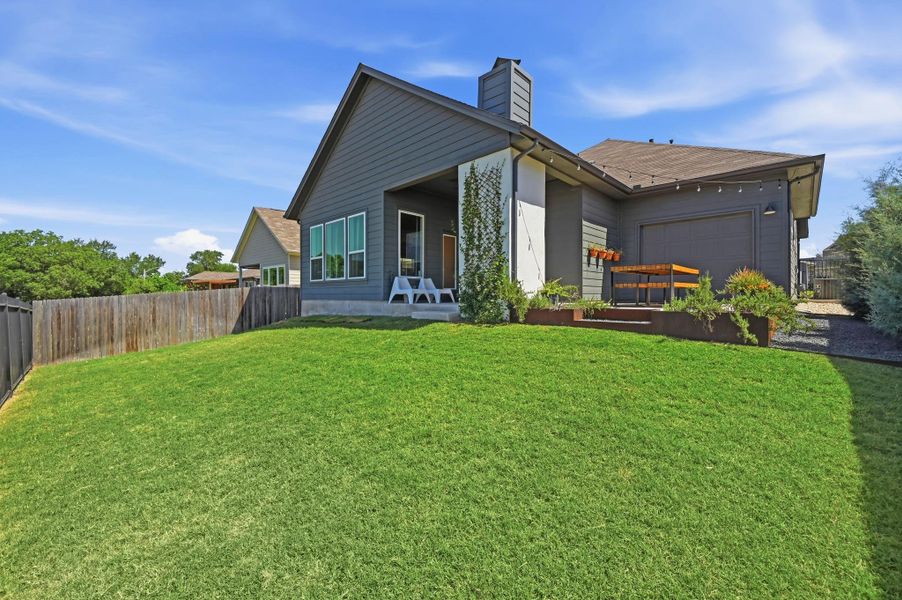 Exterior details and patio area of a home in Loyola, Austin (Image 23).