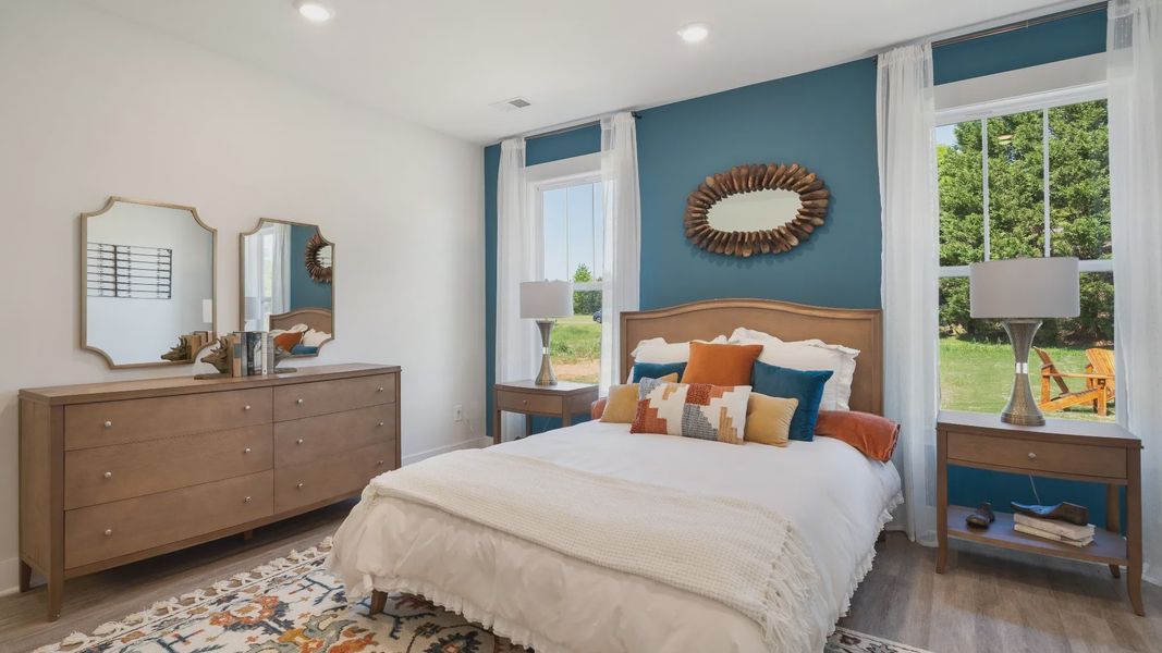 Luxurious primary retreat with spacious proportions and calming ambiance at the new Benjamin's Grove community