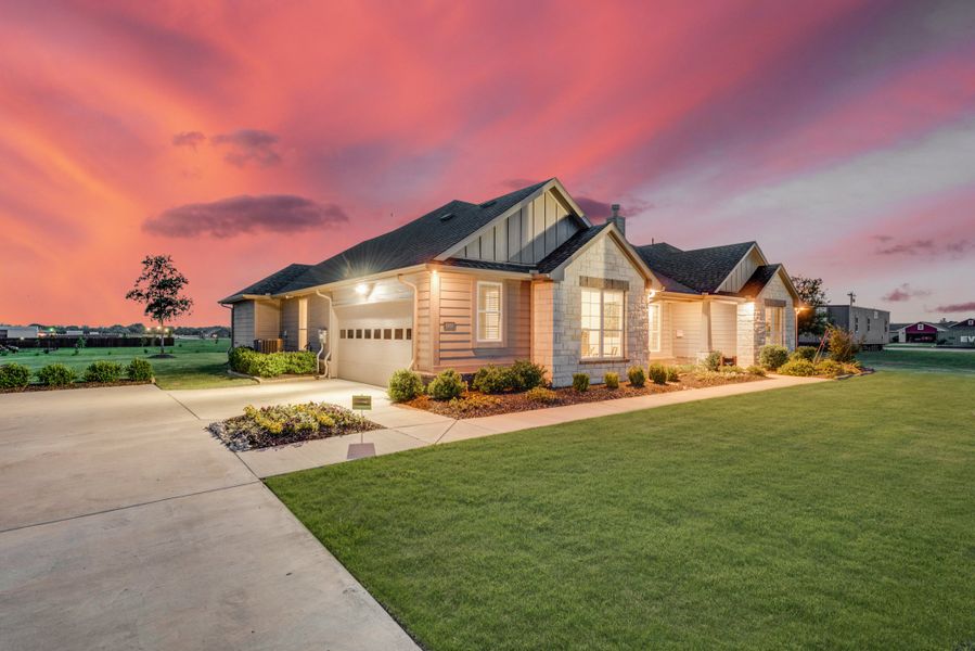 Front exterior of a new home in Oak Valley, Terrell, TX, highlighting curb appeal (Image 27).