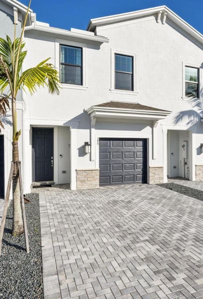 Exterior details and patio area of a home in , Stuart (Image 1).