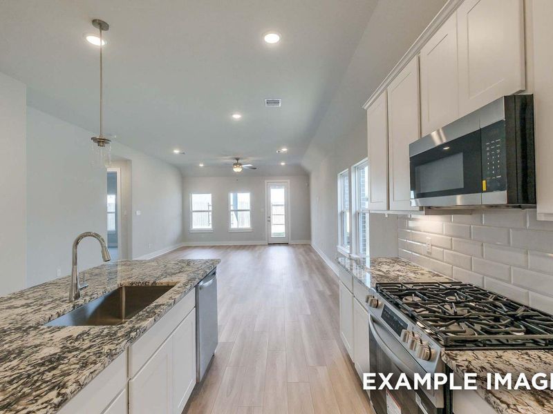 Furnished interior view inside a new home in Enclave at Newport, Crosby (Image 6).