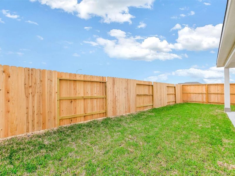 Exterior details and patio area of a home in Emberly, Beasley (Image 24).