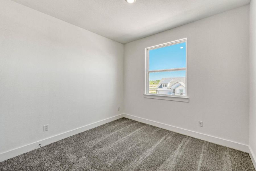 Spacious, unfurnished interior of a new home in Freedom at Anthem, Kyle (Image 21).