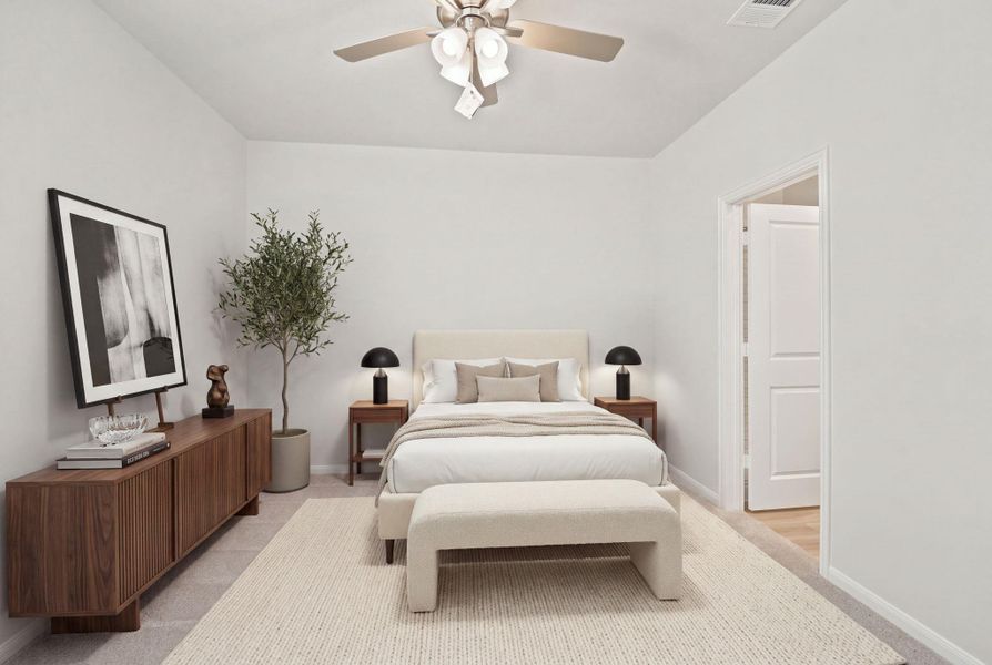 Clean architectural lines define this welcoming bedroom space.