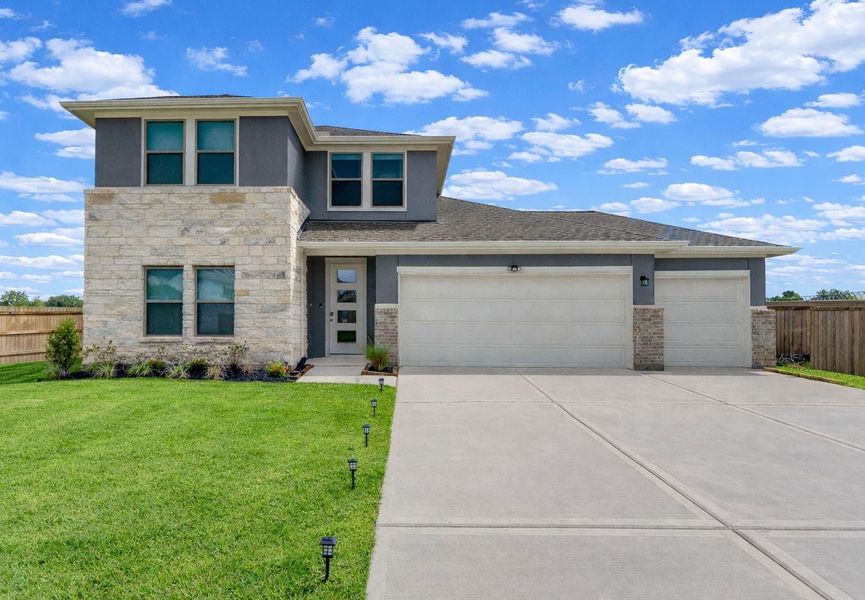 Front exterior of a new home in Arabella on the Prairie, Richmond, TX, highlighting curb appeal (Image 26).