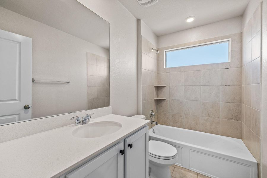 Full bathroom with vanity and bathing tub / shower combination