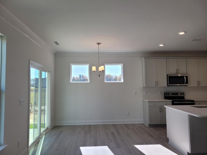 Furnished interior view inside a new home in 1158 Place, Wilson (Image 4).