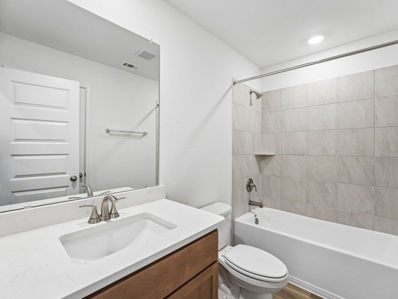 Furnished interior view inside a new home in Butler Farms - Boulevard Collection, Liberty Hill (Image 7).