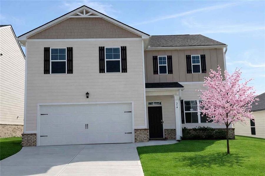 Front exterior of a new home in Twin Lakes, Hoschton, GA, highlighting curb appeal (Image 1). Front exterior of a new home in Twin Lakes, Hoschton, GA, highlighting curb appeal (Image 1).