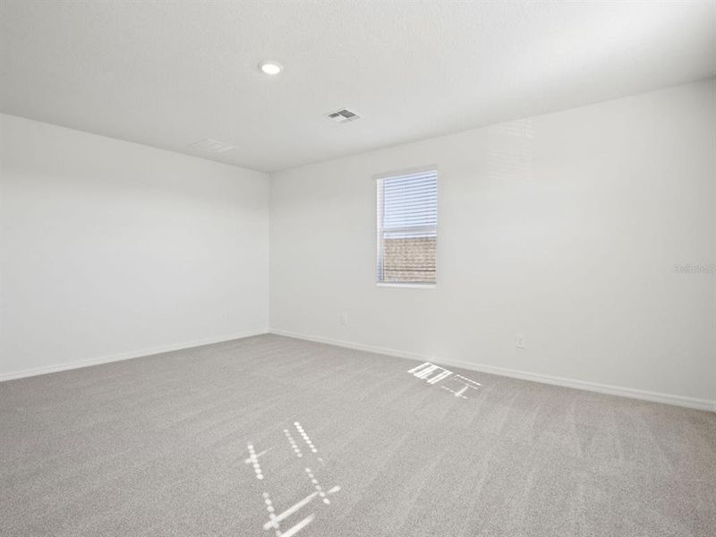 Spacious, unfurnished interior of a new home in Coasterra - Reserve Series, Palmetto (Image 26).