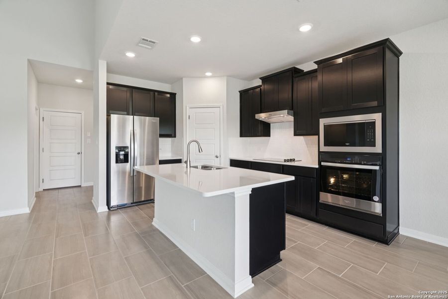 Furnished interior view inside a new home in Legendary Trails - Classic Series, Cibolo (Image 6). Furnished interior view inside a new home in Legendary Trails - Classic Series, Cibolo (Image 6).