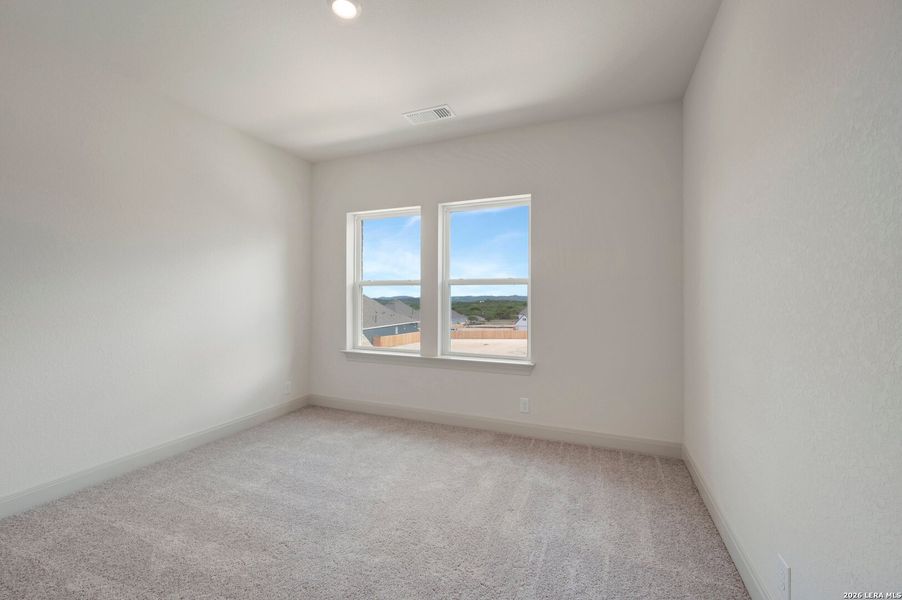 Spacious, unfurnished interior of a new home in Windsong - Legacy Series, Boerne (Image 44).