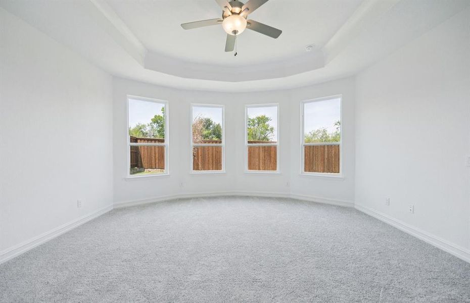 Spacious owner's suite highlighted by large windows and an exquisite tray ceiling Spacious owner's suite highlighted by large windows and an exquisite tray ceiling