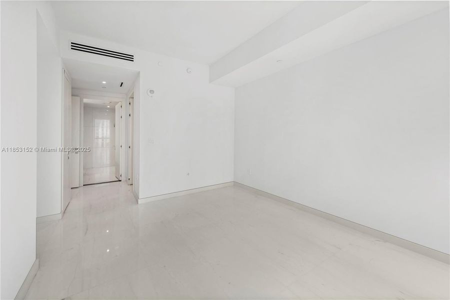 Spacious, unfurnished interior of a new home in Aston Martin Residences, Miami (Image 22).