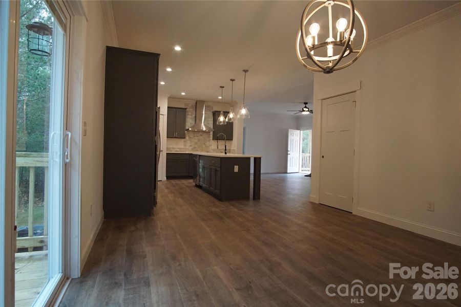 Dining room looking back to kitchen