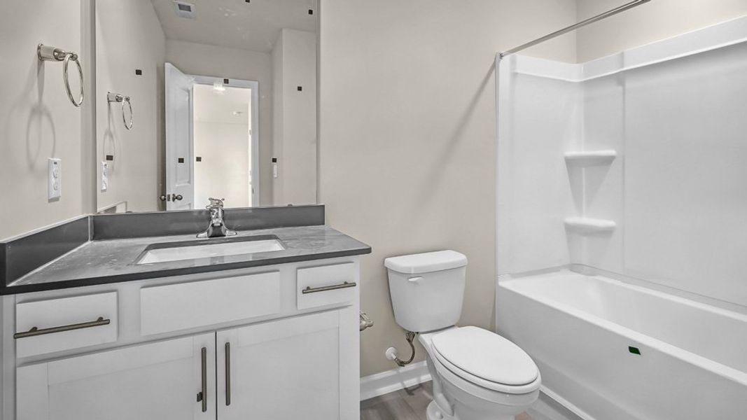 Furnished interior view inside a new home in North Gate, Vass (Image 9).