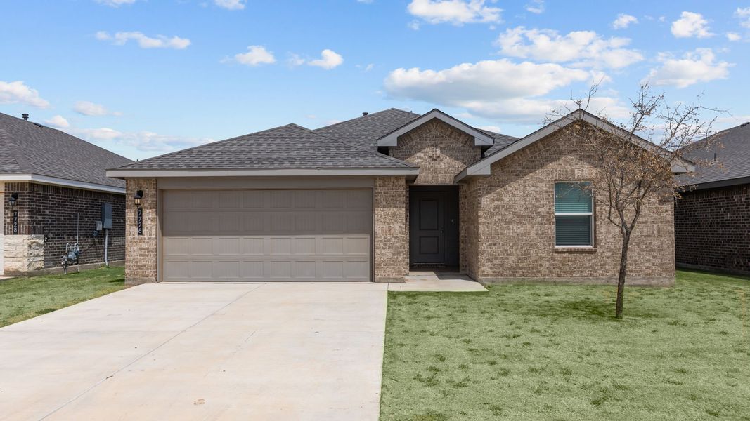 Front exterior of a new home in Everest Heights, Lubbock, TX, highlighting curb appeal (Image 1). Front exterior of a new home in Everest Heights, Lubbock, TX, highlighting curb appeal (Image 1).