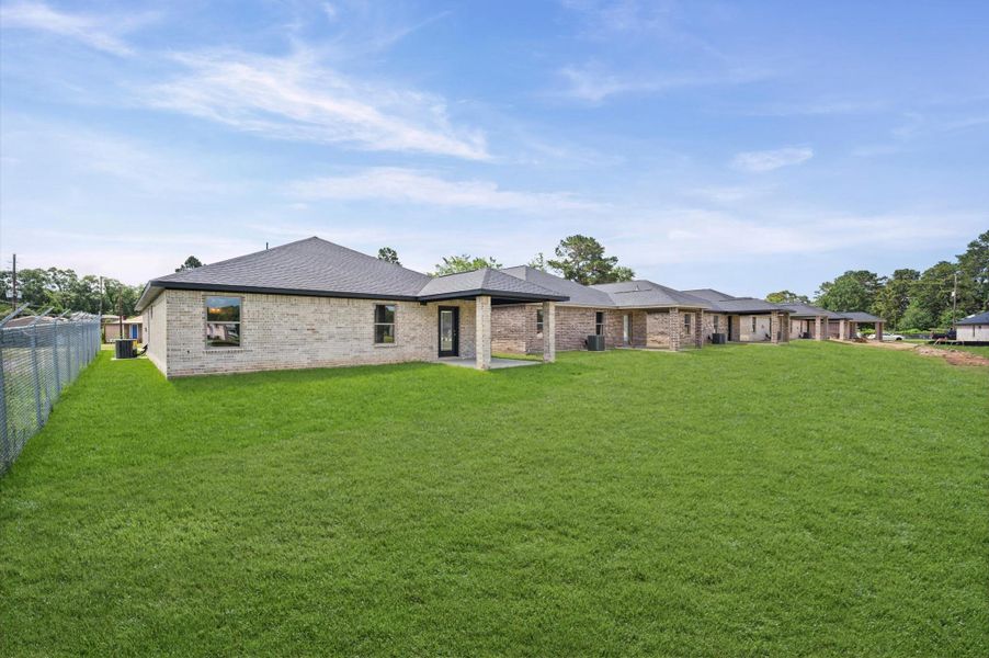 Exterior details and patio area of a home in , Willis (Image 26).