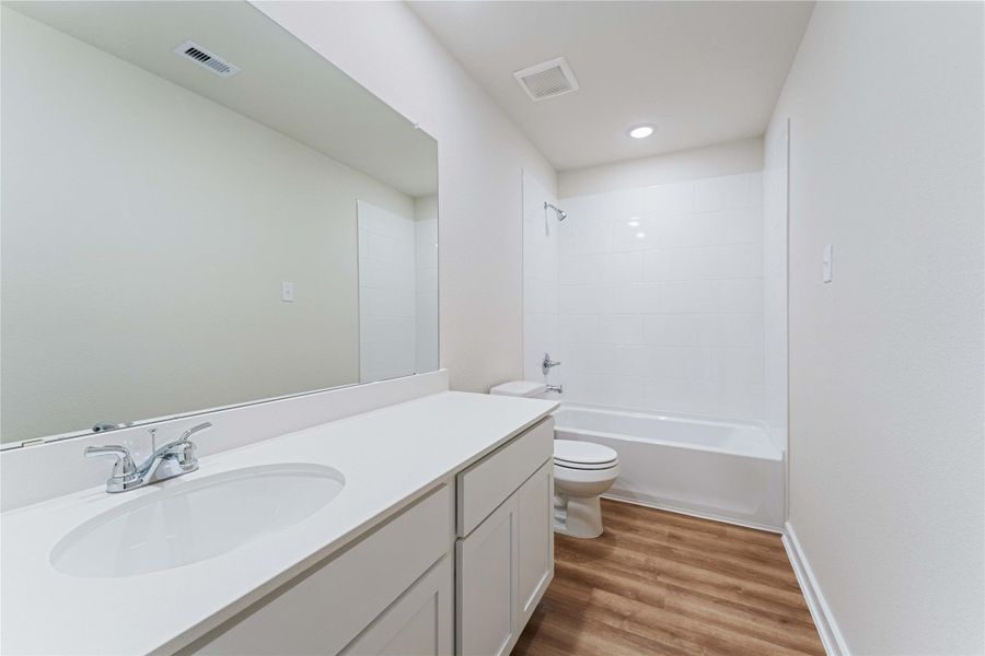 Furnished interior view inside a new home in Lexington Heights, Willis (Image 3).