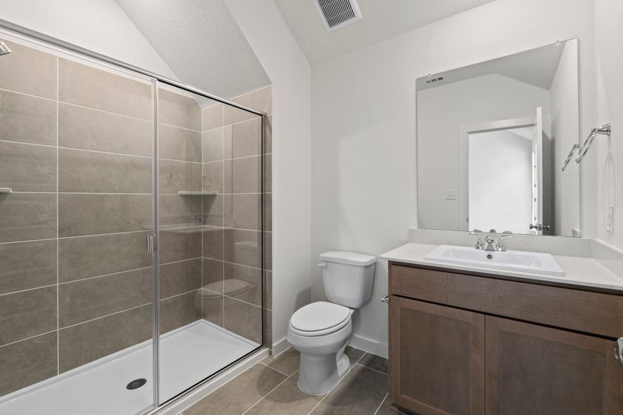 Bathroom in the Pearl home plan by Trophy Signature Homes – REPRESENTATIVE PHOTO