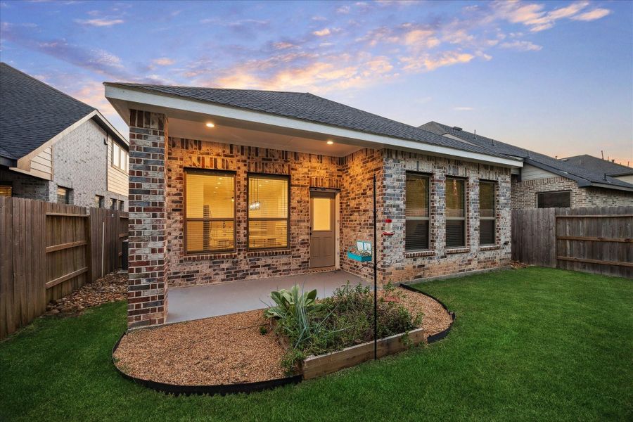 Exterior details and patio area of a home in , Conroe (Image 3).