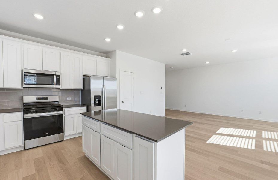 Furnished interior view inside a new home in Cameron Place, Manor (Image 8).