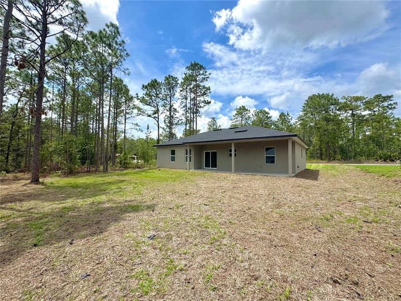 Exterior details and patio area of a home in , Dunnellon (Image 20).