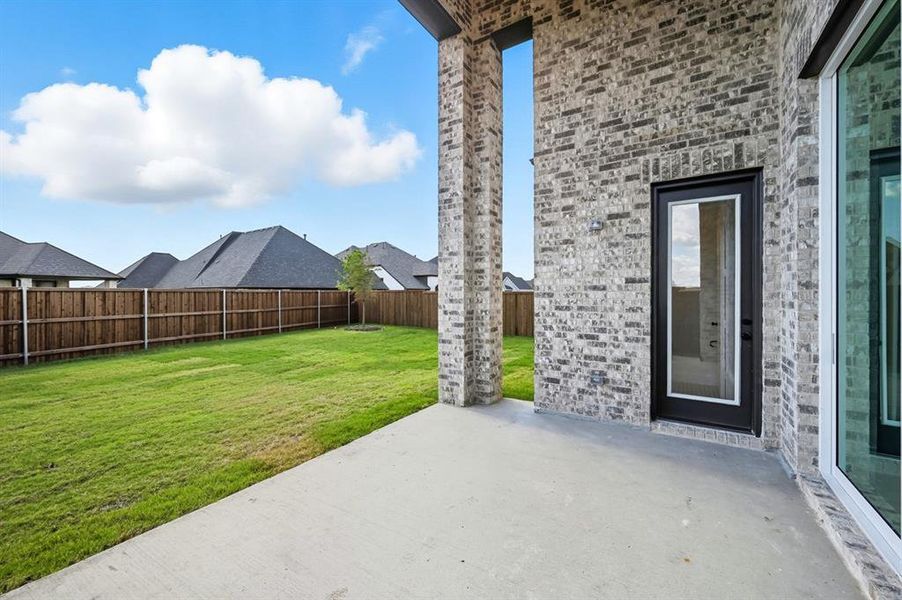 Exterior details and patio area of a home in Star Trail: 55ft. lots, Prosper (Image 3). Exterior details and patio area of a home in Star Trail: 55ft. lots, Prosper (Image 3).