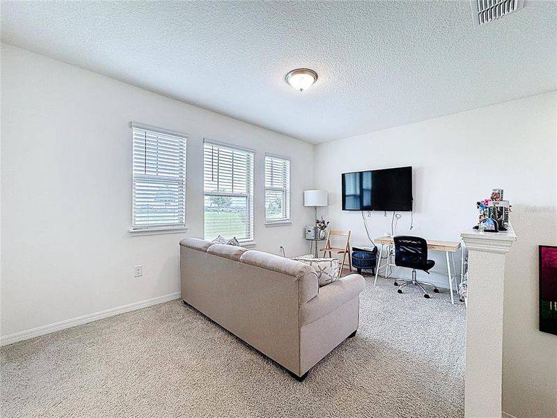 Furnished interior view inside a new home in , Winter Garden (Image 6).