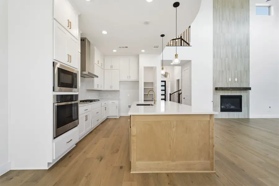 Furnished interior view inside a new home in Green Meadows, Celina (Image 10).