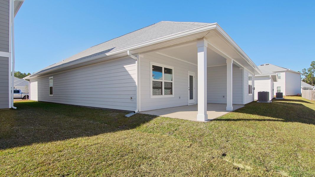 Exterior details and patio area of a home in Bayside at Ward Creek, Panama City Beach (Image 2).