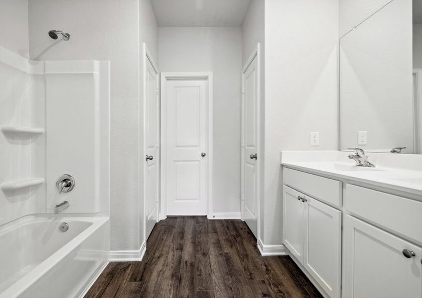 Vanity with great storage and a shower/tub combination in the master bathroom Vanity with great storage and a shower/tub combination in the master bathroom