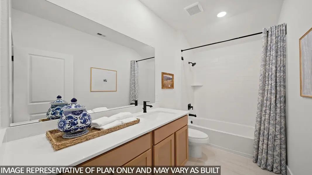 Furnished interior view inside a new home in Sunterra Lakes, Brookshire (Image 5).