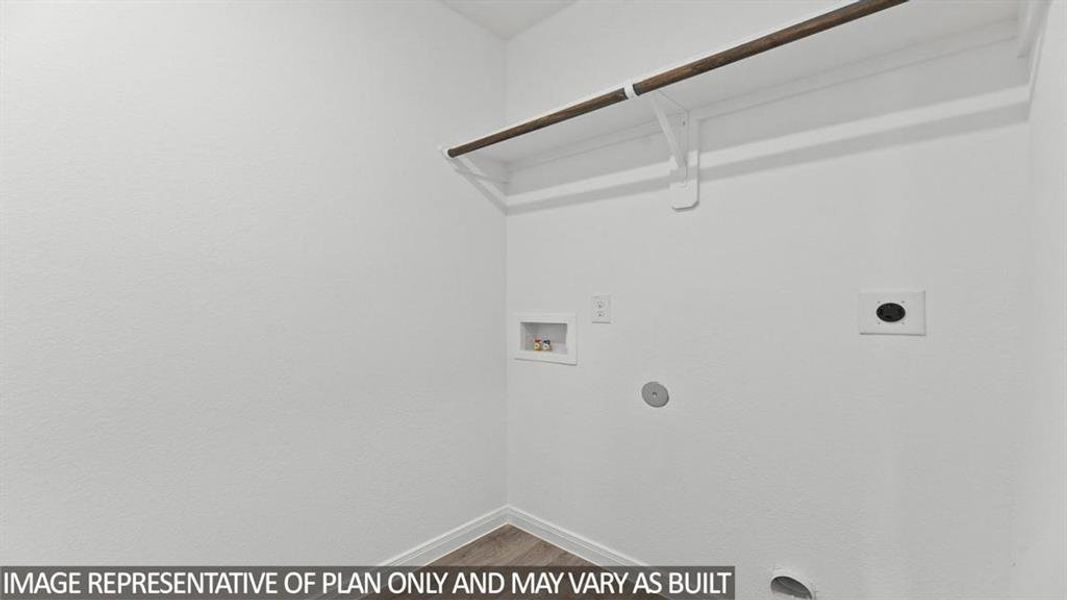 Laundry room featuring hookup for an electric dryer, washer hookup, and light wood-style flooring