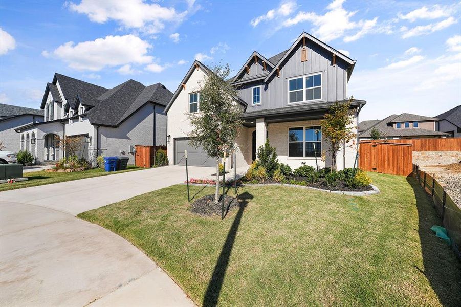 Front exterior of a new home in Aster Park, McKinney, TX, highlighting curb appeal (Image 25).