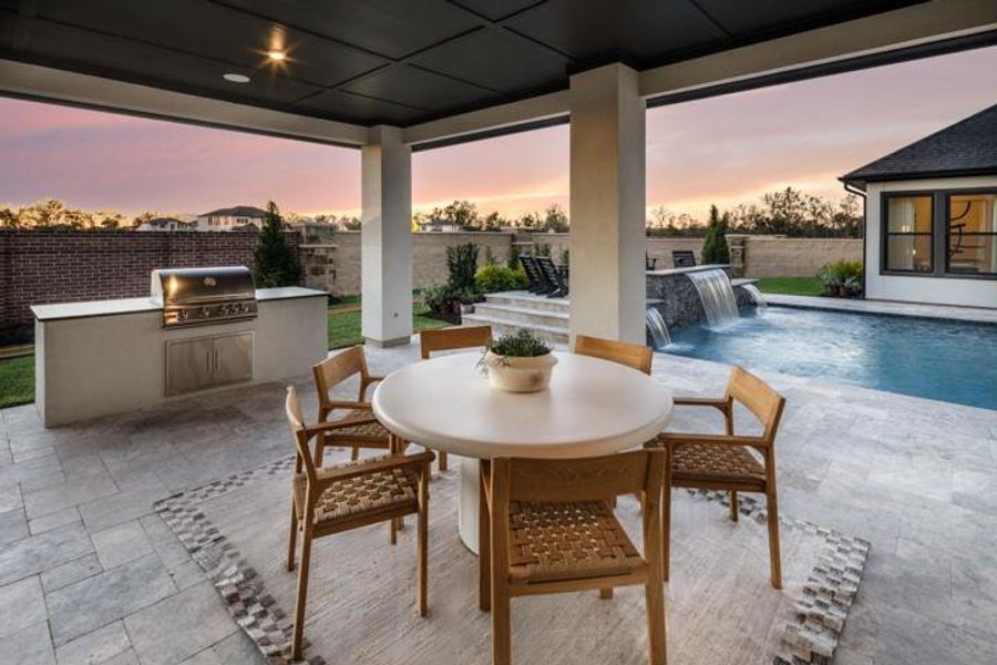 Exterior details and patio area of a home in Sienna, Missouri City (Image 26).