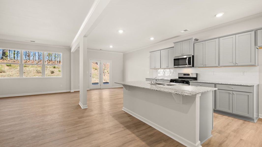Representative furnished interior of a home built from the Halton by D.R. Horton in Northwoods at Mirror Lake, Villa Rica (Image 5).